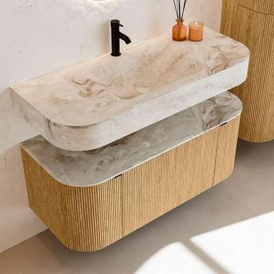 MONDIAZ THOR-DLUX 110cm badmeubel ronding links + rechts kleur Oak met 1 lade en 2 deuren. Vrijhangende wastafel CLOUD Midden 1 kraangat kleur Frappe.