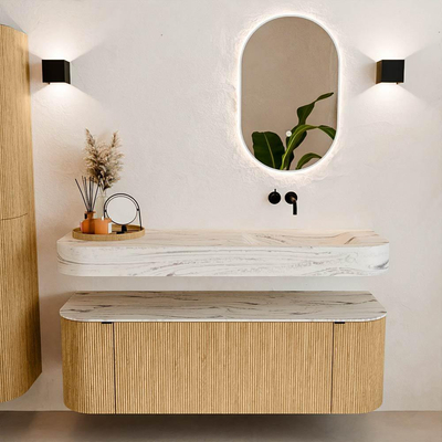 MONDIAZ THOR-DLUX 140cm badmeubel ronding links + rechts kleur Oak met 1 lade en 2 deuren. Vrijhangende wastafel CLOUD Rechts zonder kraangat kleur Nata.