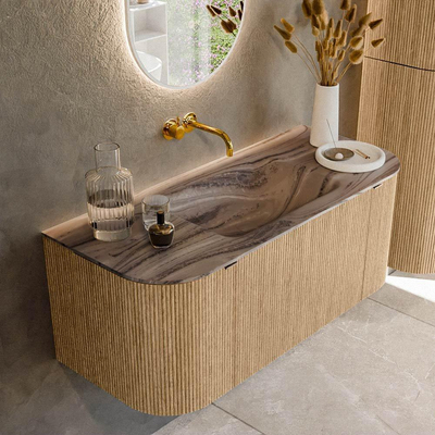 MONDIAZ KURVE-DLUX 110cm badmeubel ronding Links + Rechts kleur Oak met 1 lade en 2 deuren. Wastafel CLOUD Midden zonder kraangat Sombra.