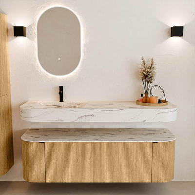 MONDIAZ THOR-DLUX 150cm badmeubel ronding links + rechts kleur Oak met 1 lade en 2 deuren. Vrijhangende wastafel CLOUD Links 1 kraangat kleur Nata.