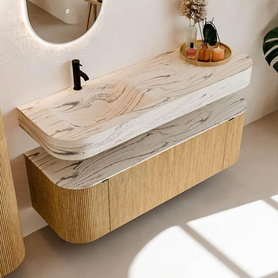 MONDIAZ THOR-DLUX 140cm badmeubel ronding links + rechts kleur Oak met 1 lade en 2 deuren. Vrijhangende wastafel CLOUD Links 1 kraangat kleur Nata.