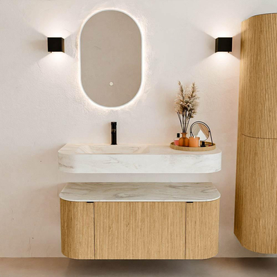 MONDIAZ THOR-DLUX 110cm badmeubel ronding links + rechts kleur Oak met 1 lade en 2 deuren. Vrijhangende wastafel CLOUD Links 1 kraangat kleur Ostra.