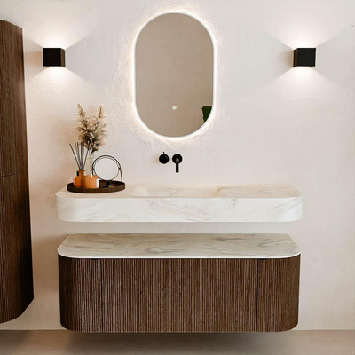 MONDIAZ THOR-DLUX 130cm badmeubel ronding links + rechts kleur Walnut met 1 lade en 2 deuren. Vrijhangende wastafel CLOUD Midden zonder kraangat kleur Ostra.