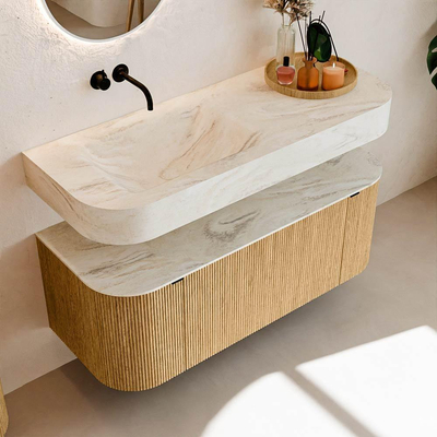 MONDIAZ THOR-DLUX 120cm badmeubel ronding links + rechts kleur Oak met 1 lade en 2 deuren. Vrijhangende wastafel CLOUD Links zonder kraangat kleur Ostra.