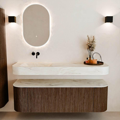 MONDIAZ THOR-DLUX 150cm badmeubel ronding links + rechts kleur Walnut met 1 lade en 2 deuren. Vrijhangende wastafel CLOUD Links zonder kraangat kleur Ostra.