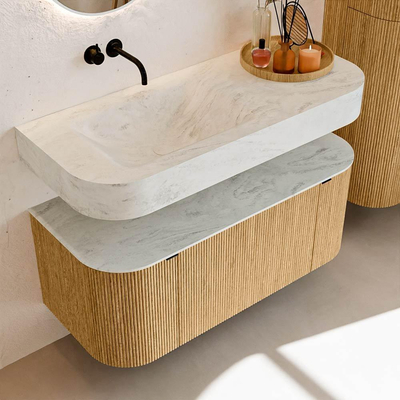 MONDIAZ THOR-DLUX 110cm badmeubel ronding links + rechts kleur Oak met 1 lade en 2 deuren. Vrijhangende wastafel CLOUD Links zonder kraangat kleur Opalo.