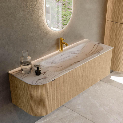 MONDIAZ KURVE-DLUX 135cm badmeubel ronding Links kleur Oak met 1 lade en 1 deur. Wastafel BIG MEDIUM Rechts 1 kraangat Nata.