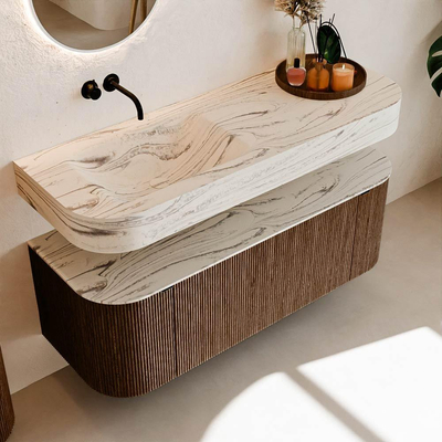 MONDIAZ THOR-DLUX 130cm badmeubel ronding links + rechts kleur Walnut met 1 lade en 2 deuren. Vrijhangende wastafel CLOUD Links zonder kraangat kleur Nata.