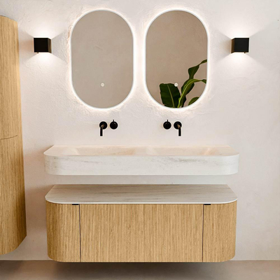 MONDIAZ THOR-DLUX 130cm badmeubel ronding links + rechts kleur Oak met 1 lade en 2 deuren. Vrijhangende wastafel CLOUD Dubbel zonder kraangat kleur Meli.