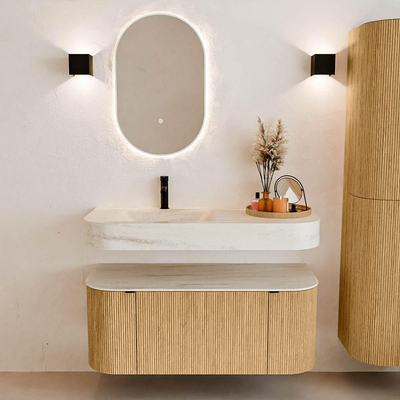 MONDIAZ THOR-DLUX 110cm badmeubel ronding links + rechts kleur Oak met 1 lade en 2 deuren. Vrijhangende wastafel CLOUD Links 1 kraangat kleur Meli.