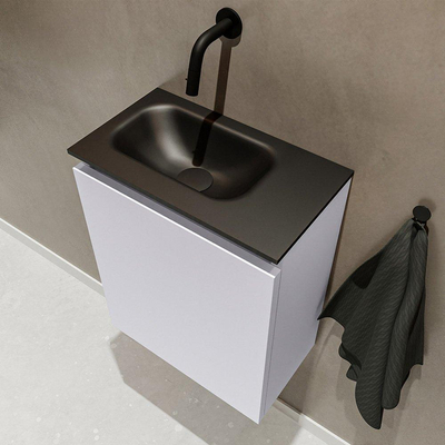 MONDIAZ TURE Toiletmeubel 40x23x50cm met 0 kraangaten 1 deuren cale mat Wastafel Eden links Solid Surface Zwart