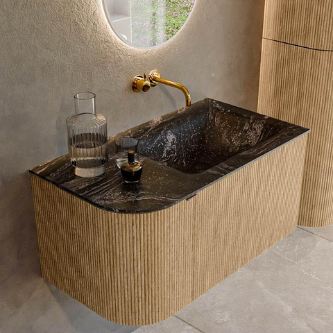 MONDIAZ KURVE-DLUX Meuble de salle de bains 85 cm avec module 25 L couleur chêne avec 1 tiroir et 1 porte. Lavabo CLOUD à droite sans trou de robinet couleur lave. SW1138085