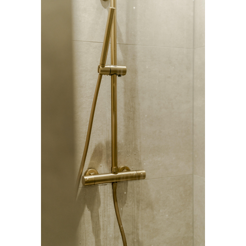 Fortifura Calvi Regendoucheset - thermostatisch - 25cm hoofddouche - metalen slang - staafhanddouche - Geborsteld Messing PVD (Goud) SW788000