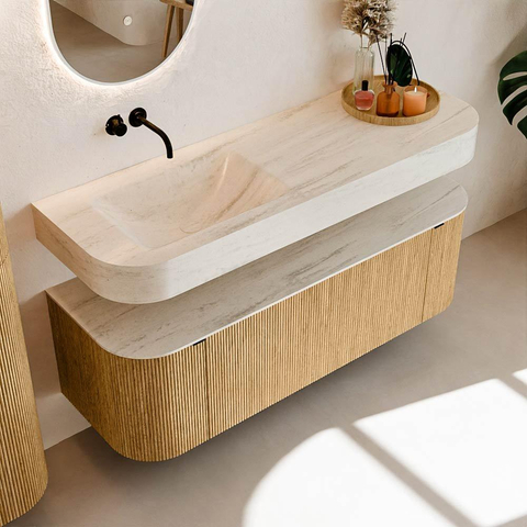 MONDIAZ THOR-DLUX 140cm badmeubel ronding links + rechts kleur Oak met 1 lade en 2 deuren. Vrijhangende wastafel CLOUD Links zonder kraangat kleur Meli. SW1464380
