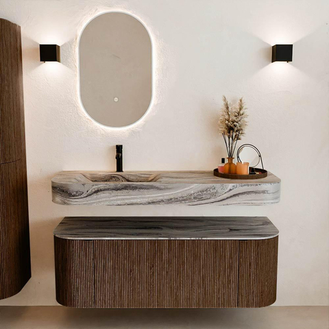 MONDIAZ THOR-DLUX 130cm badmeubel ronding links + rechts kleur Walnut met 1 lade en 2 deuren. Vrijhangende wastafel CLOUD Links 1 kraangat kleur Sombra. SW1464051