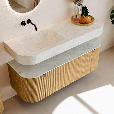 MONDIAZ THOR-DLUX 130cm badmeubel ronding links + rechts kleur Oak met 1 lade en 2 deuren. Vrijhangende wastafel CLOUD Links zonder kraangat kleur Opalo. SW1463545