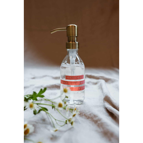 Wellmark Handzeep helder glas messing pomp 250ml tekst MAY ALL YOUR TROUBLES BE BUBBLES Roze label SW773936