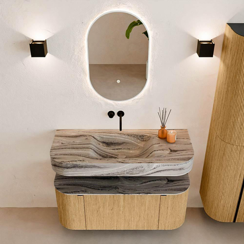 MONDIAZ THOR-DLUX 110cm badmeubel ronding links + rechts kleur Oak met 1 lade en 2 deuren. Vrijhangende wastafel CLOUD Midden zonder kraangat kleur Sombra. SW1463054
