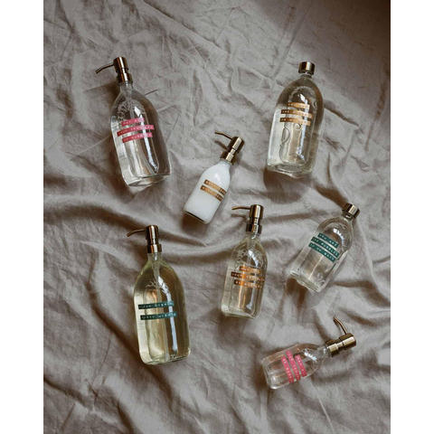 Wellmark Handzeep helder glas messing pomp 250ml tekst MAY ALL YOUR TROUBLES BE BUBBLES Roze label SW773936
